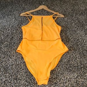 Orange body suit